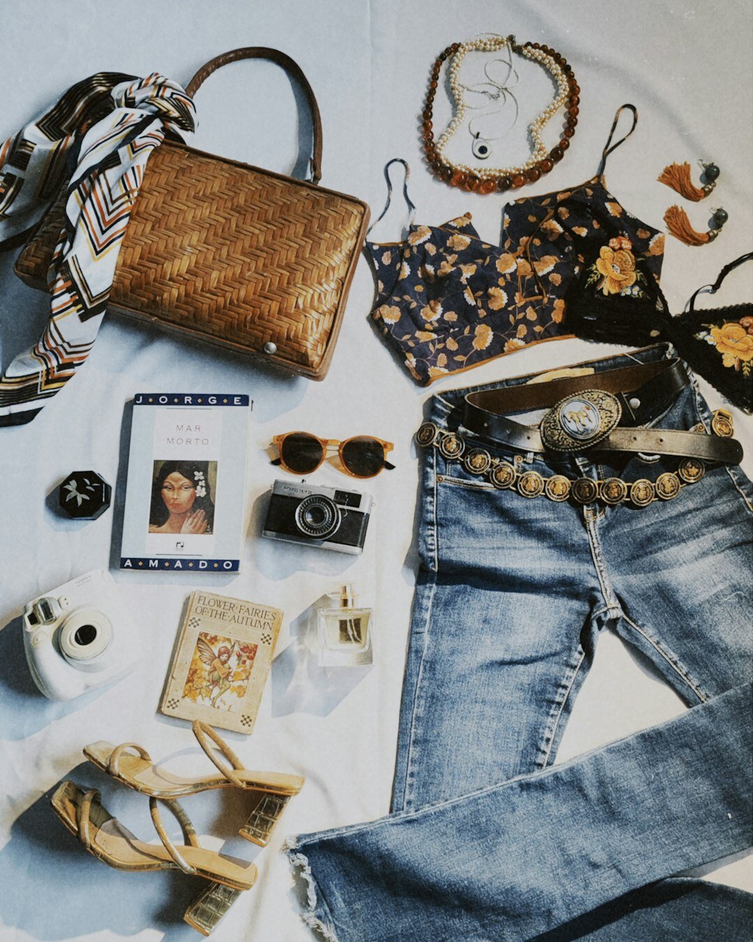 Fashion editorial still life with vintage garments and accessories
